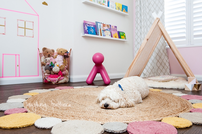 dog on mat in child's bedroom